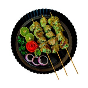 Chicken Hariyali Kebab served at City Kebab and Cafe with mint chutney and salad