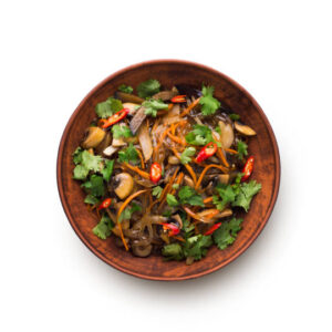 Colorful plate of City Cafe Special Thai Vegetable stir-fry with vibrant fresh vegetables and Thai herbs.