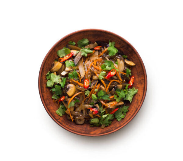 Colorful plate of City Cafe Special Thai Vegetable stir-fry with vibrant fresh vegetables and Thai herbs.