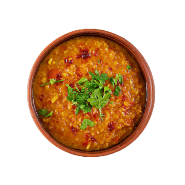 A creamy bowl of authentic Chonar Dal from City Kebab & Cafe, garnished with coriander, served in Dhaka.